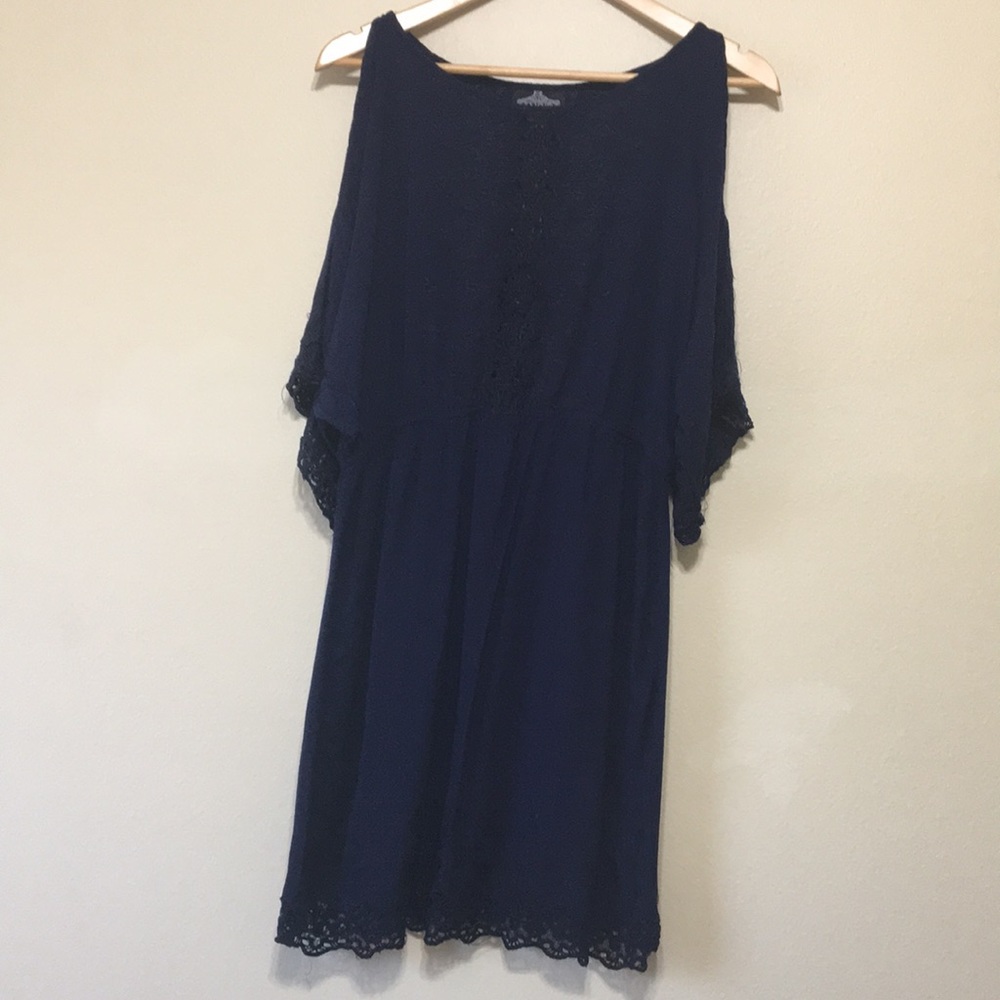 Navy blue dress with lace-like edging